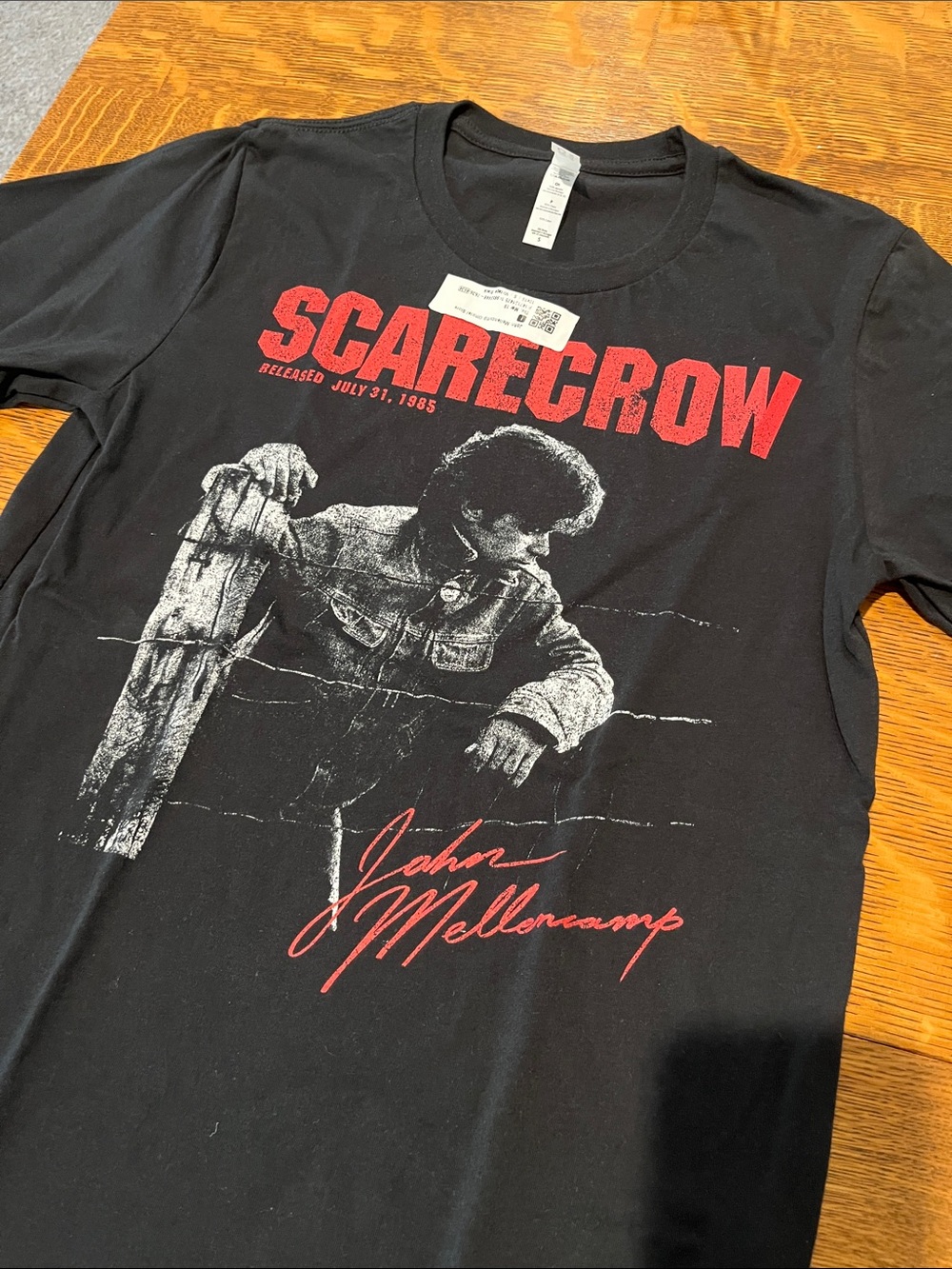 Bella Canvas Black John Mellencamp 'Scarecrow' Graphic Tee with Red Accents